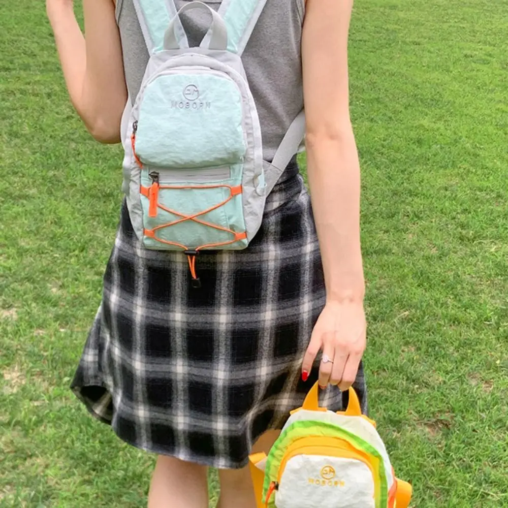 

Korean Style Outdoor Drawstring Backpack Sports Solid Color Travel Nylon Backpack Waterproof Commute Hiking Shoulder Bag Girls