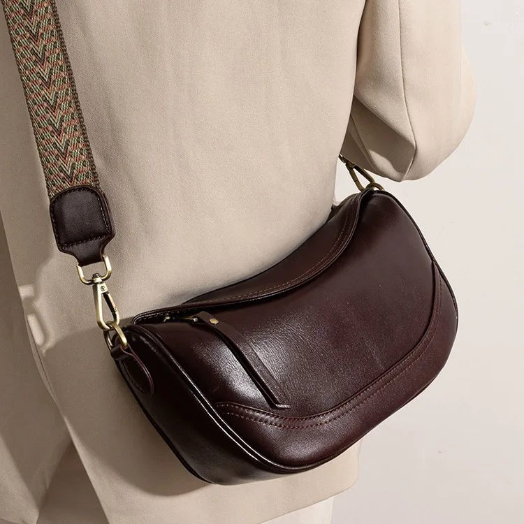 

Retro genuine leather dumpling women's bag with lid splicing single-shoulder bag for commuting and portable crossbody