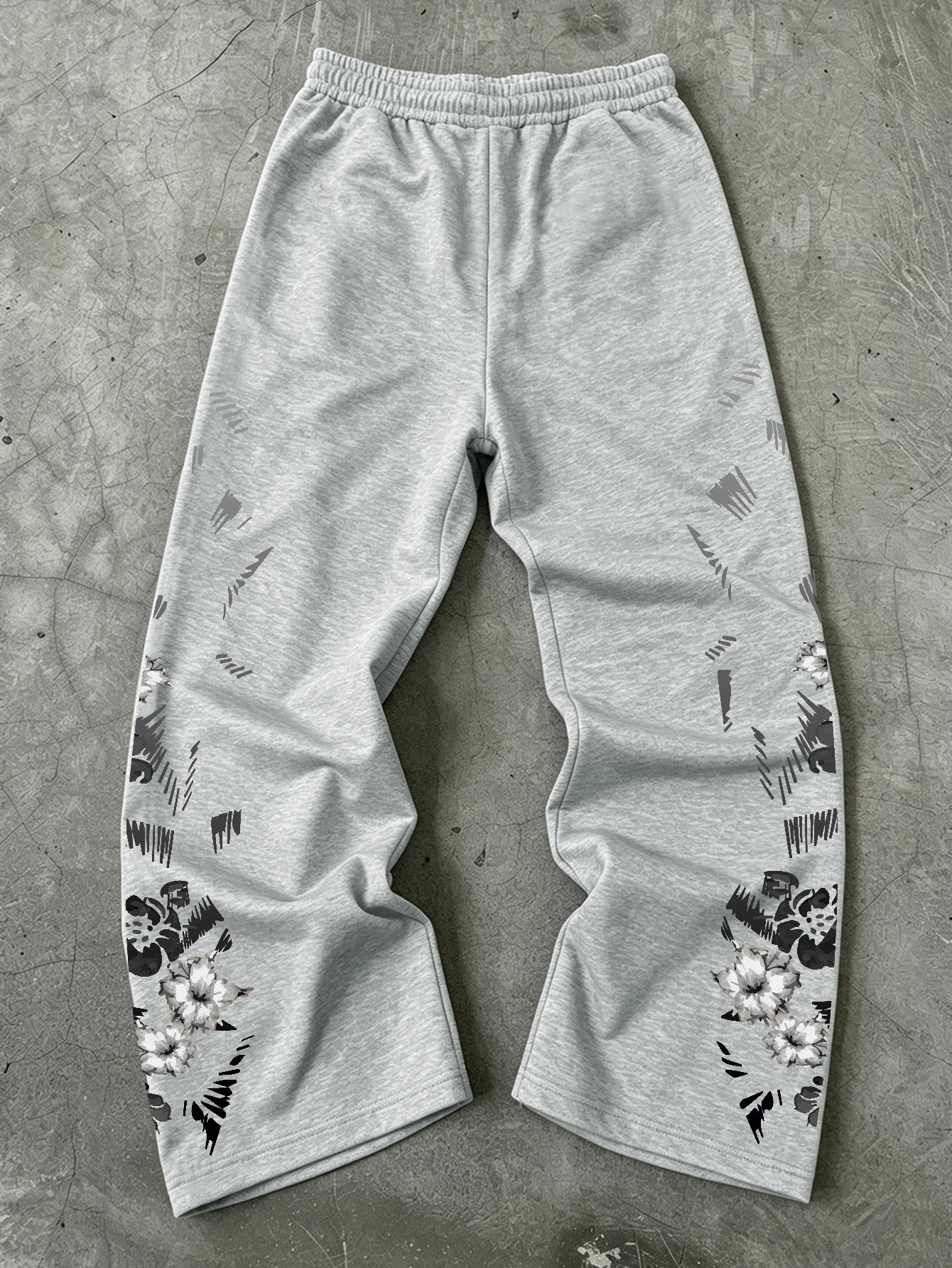 Herren-Jogginghose mit doppelseitigem Blumendruck, weitem Bein und Kordelzug – weiche, orientalische Streetwear im Hip-Hop-Stil – Detail 11