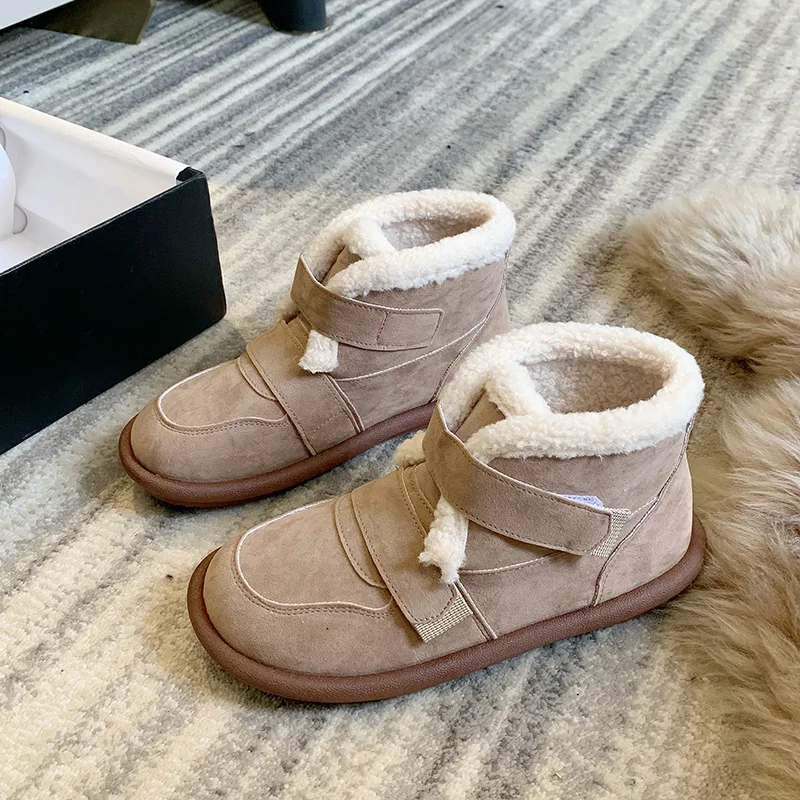أحذية الثلوج الدافئة سميكة سوليد جلد الغنم للنساء2025New الشتاء نمط الانزلاق على أحذية قطنية سميكة المضادة للانزلاق