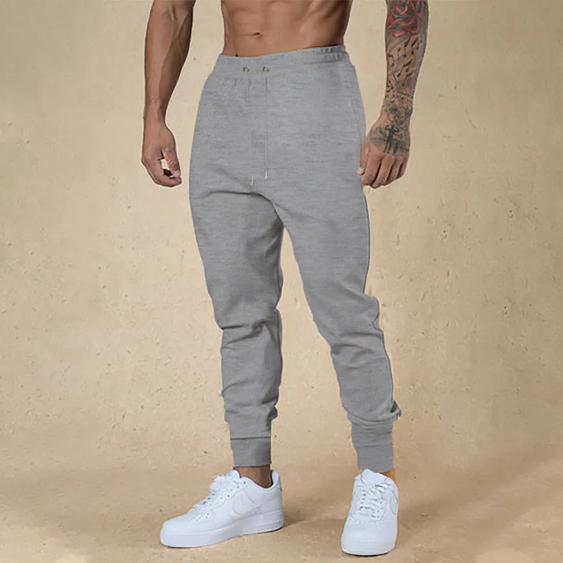 

New men's comfortable fitness running sports plain-colored casual straight-leg pants with drawstring design and pockets