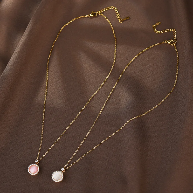 

Titanium steel rotating necklace, female cat's eye stone pendant, collarbone chain, elegant and versatile accessory