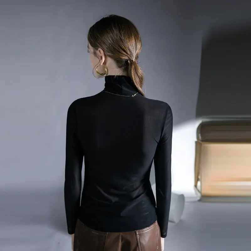 Niche อินเทรนด์ออกแบบปลอมเสื้อสองชิ้นในฤดูใบไม้ผลิใหม่เซ็กซี่ตาข่ายเสื้อ SLIM FIT ภายในสําหรับผู้หญิง