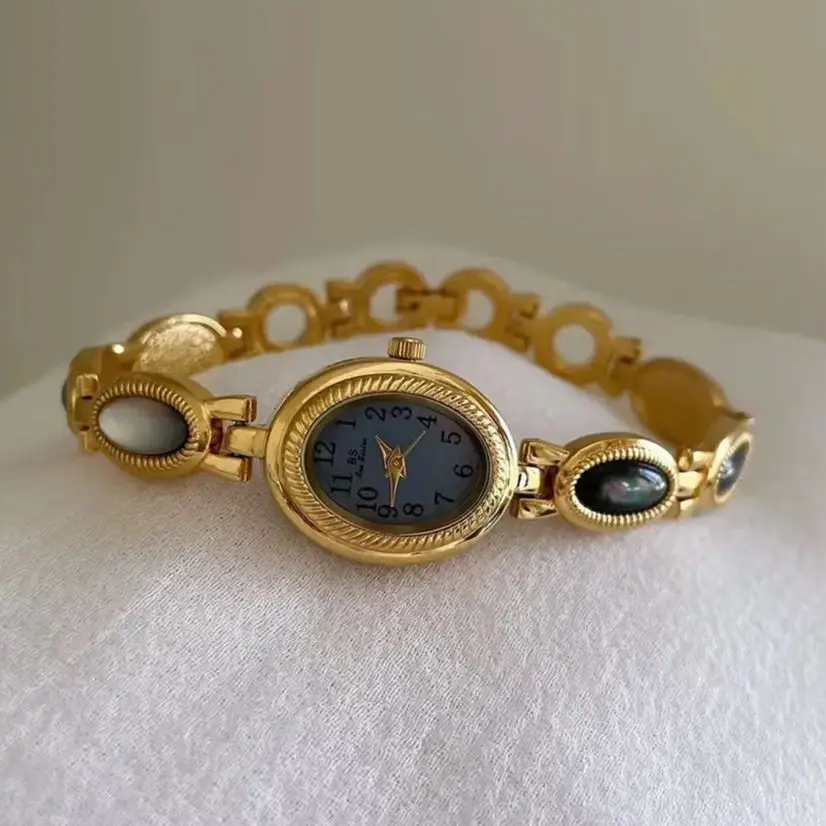 الرجعية الحد الأدنى الساعات النسائية البيضاوي الطلب الصغير الذهب مزاجه لطيف كبار الشعور من أناقة الكوارتز ساعات المعصم النسائية