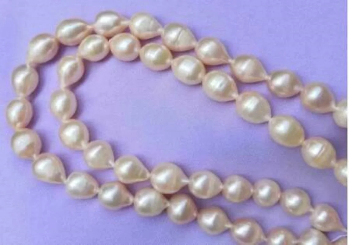 

Elegant 10x13mm South Sea Gold Pink Baroque Pearl Necklace 36"