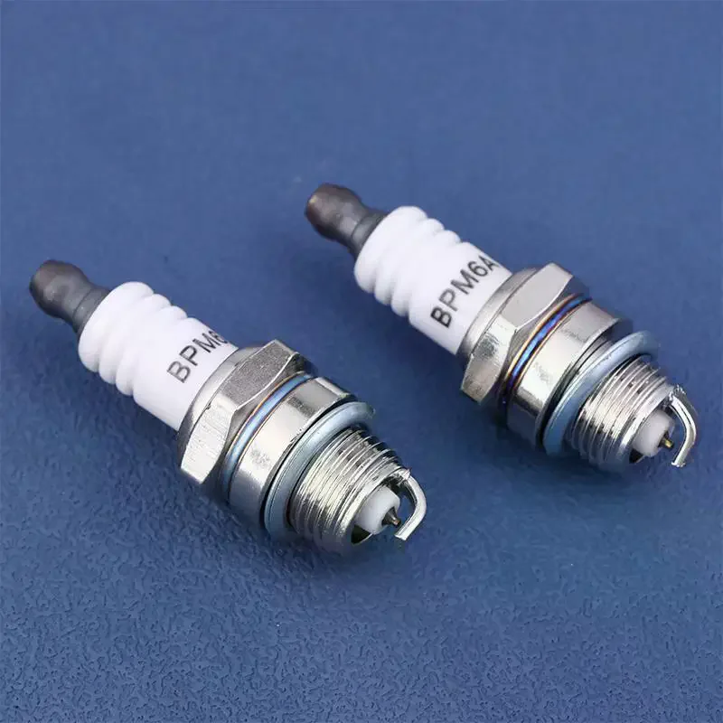 1PC Chainsaw Lawn Mower Spark Plug For Engine Motor Trimmer Spare Parts BM6A With Packaging