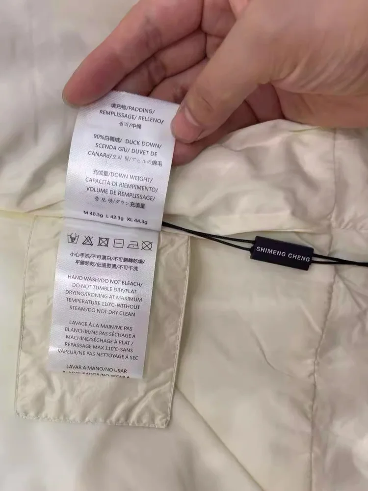 Faionable ort Svel round Nedown Jaet 2025 Autumn New Sle Women's Puffer Vest Ele Sle White Du down