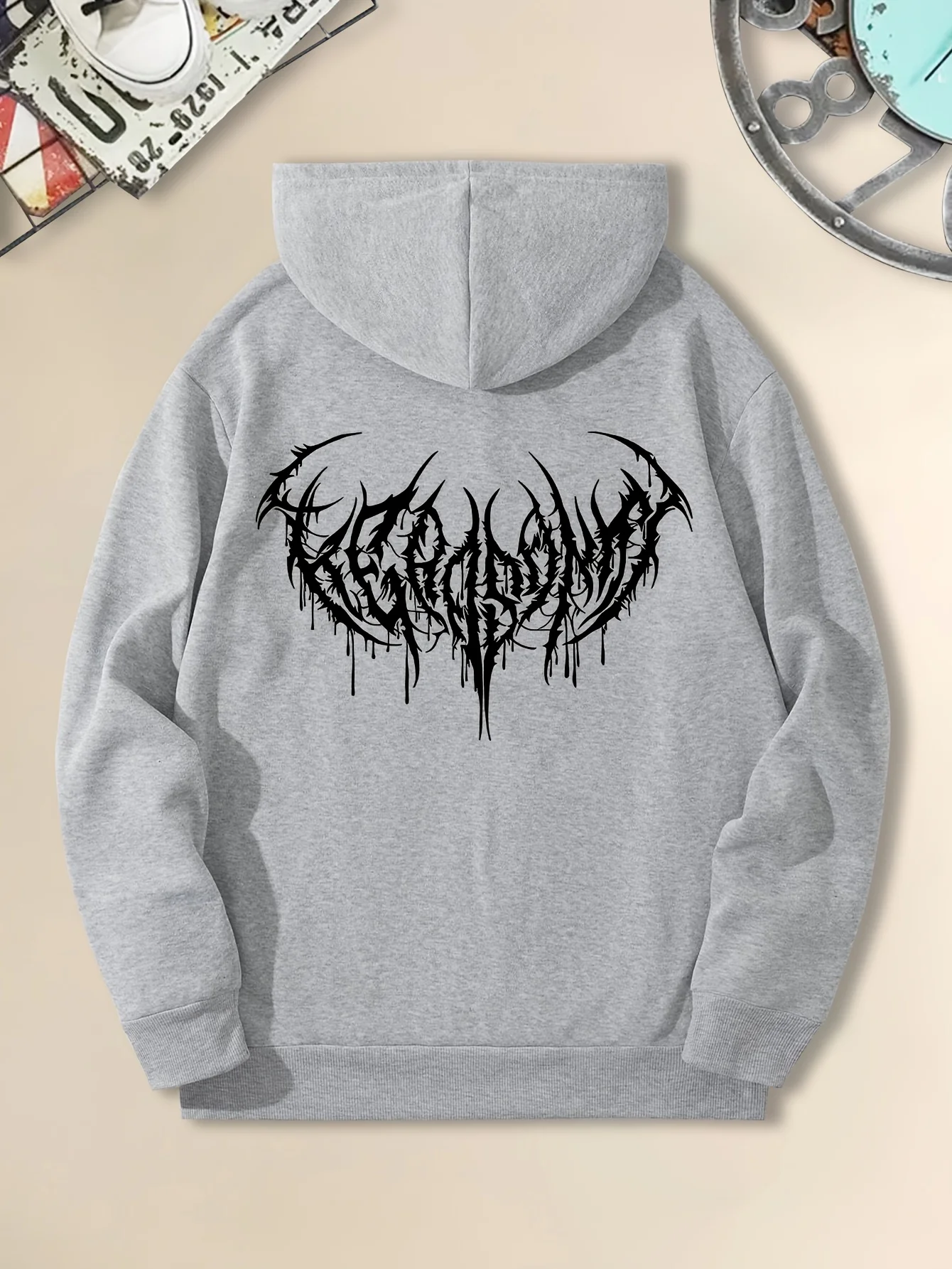 Dark metal men's hooded sweatshirt with blood-stained spikes, extreme font design on the back, kangaroo pocket, crew-necked hat.