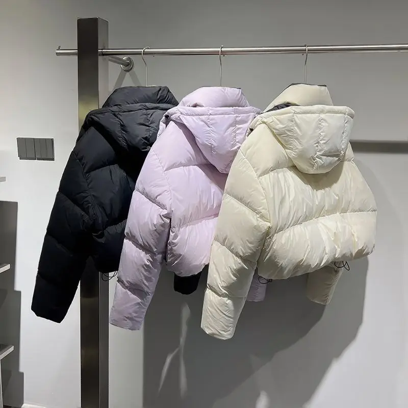 

Черные хлопковые куртки с капюшоном для женщин, зима 2025, новые теплые стеганые пальто с длинными рукавами, женская повседневная толстая верхняя одежда с высоким воротом