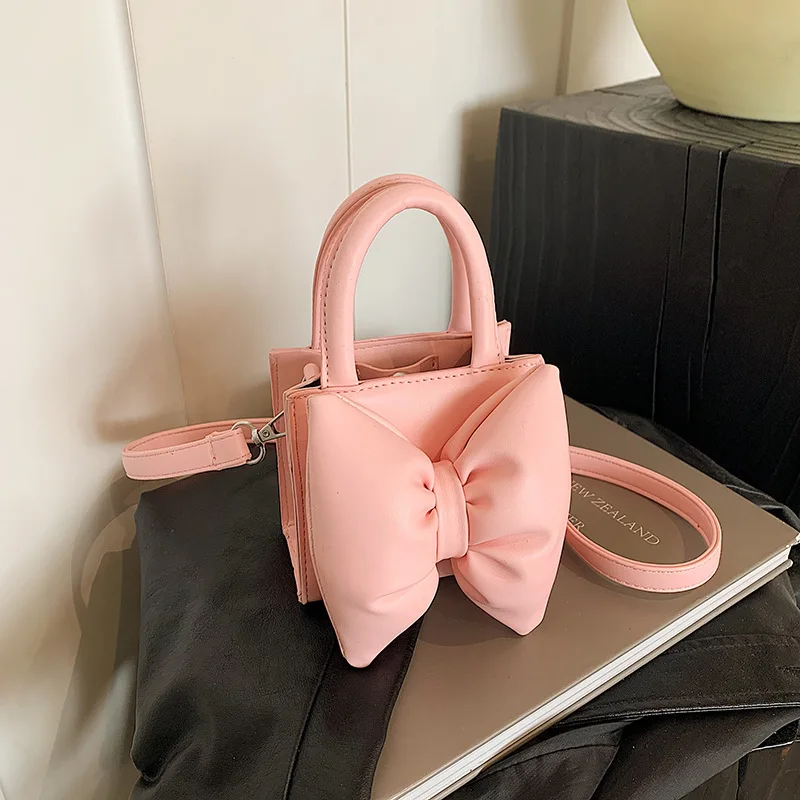 

New Butterfly Bow Small Women's Bag Cute Handheld Port Red Envelope Solid Color Versatile New Year's Mini Women's Crossbody Bag
