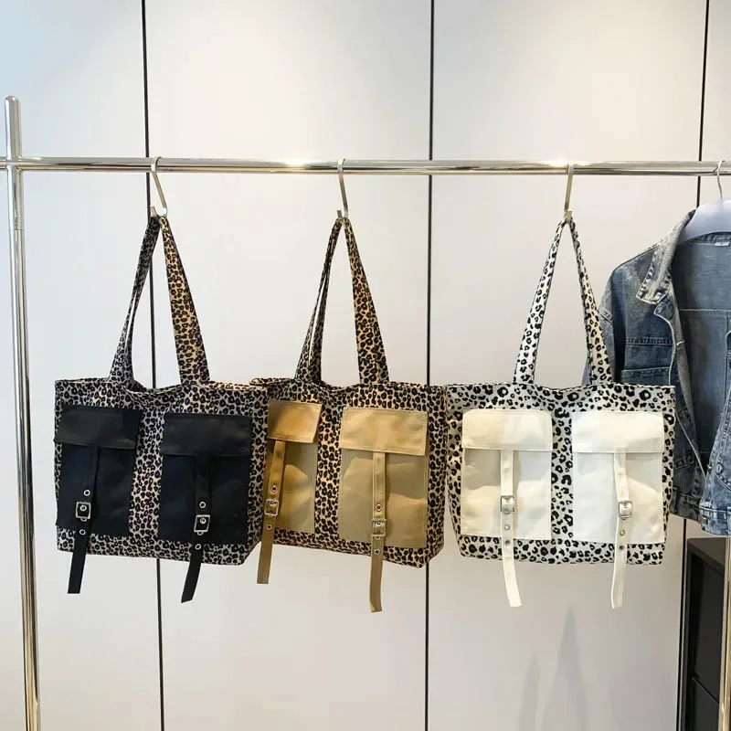 Bolsas de ombro versáteis casuais para mulheres, bolsas com zíper, lona leopardo, grande capacidade, linha de costura, venda quente, 2024