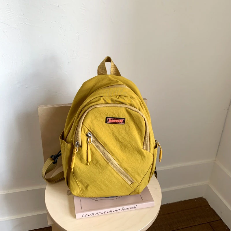 

2025 хит продаж, мягкие универсальные простые нагрудные сумки, повседневные женские рюкзаки, нейлоновые однотонные молодежные поясные сумки на молнии