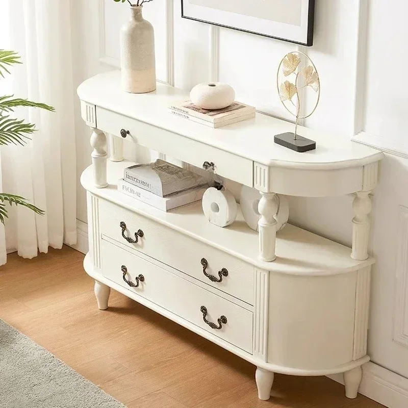 A  American retro solid wood semicircular entrance table is facing the door, and the entrance table is against the wall c