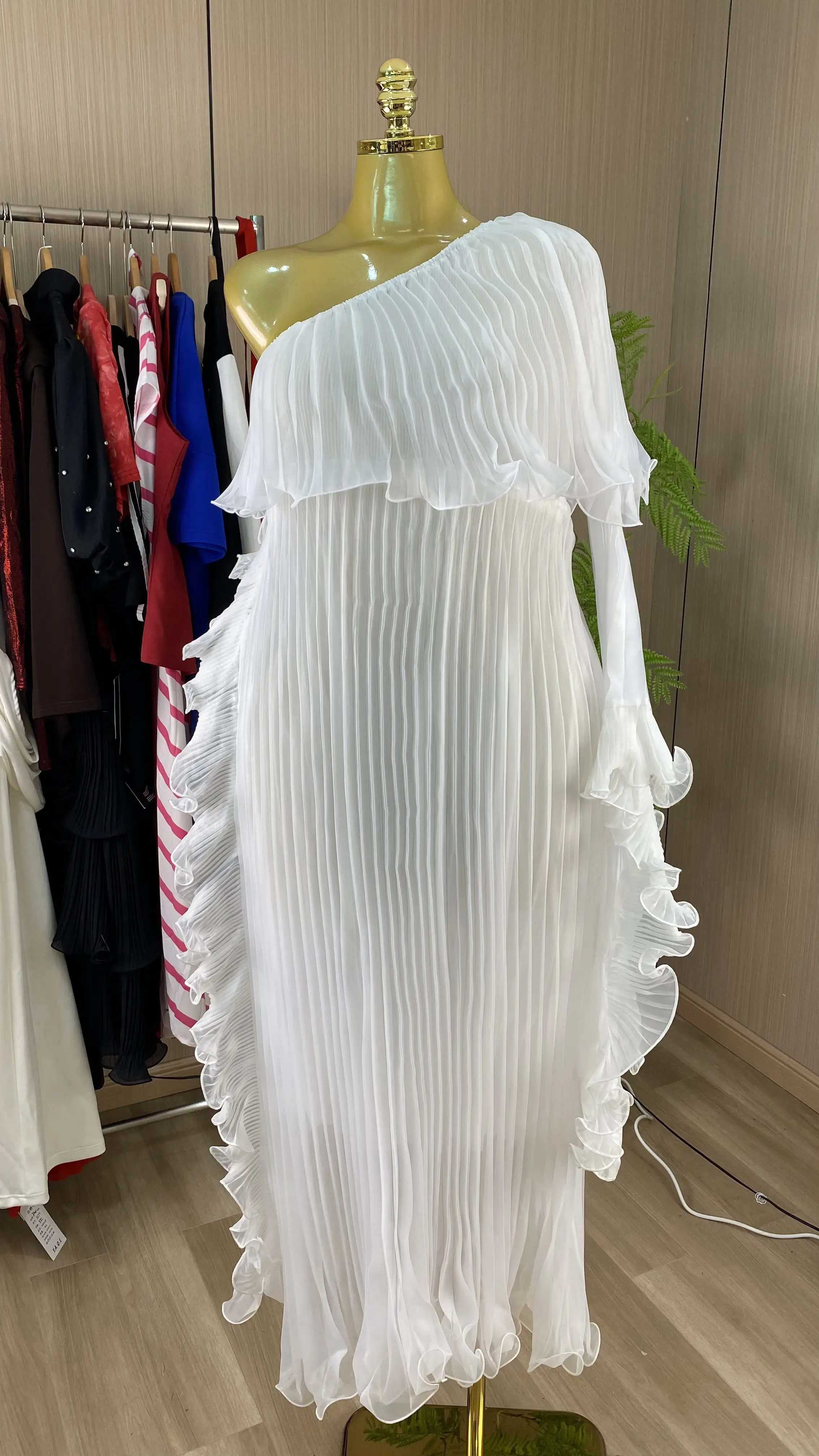 Long pleated A-line dress featuring an off-the-shoulder neckline, natural waist, and a chain belt.-GZXX982