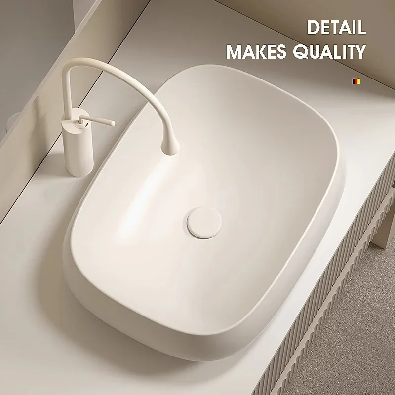 Light luxury countertop  high-end cream wind wash  ceramic basin milk white art  washbasin, hand tray.