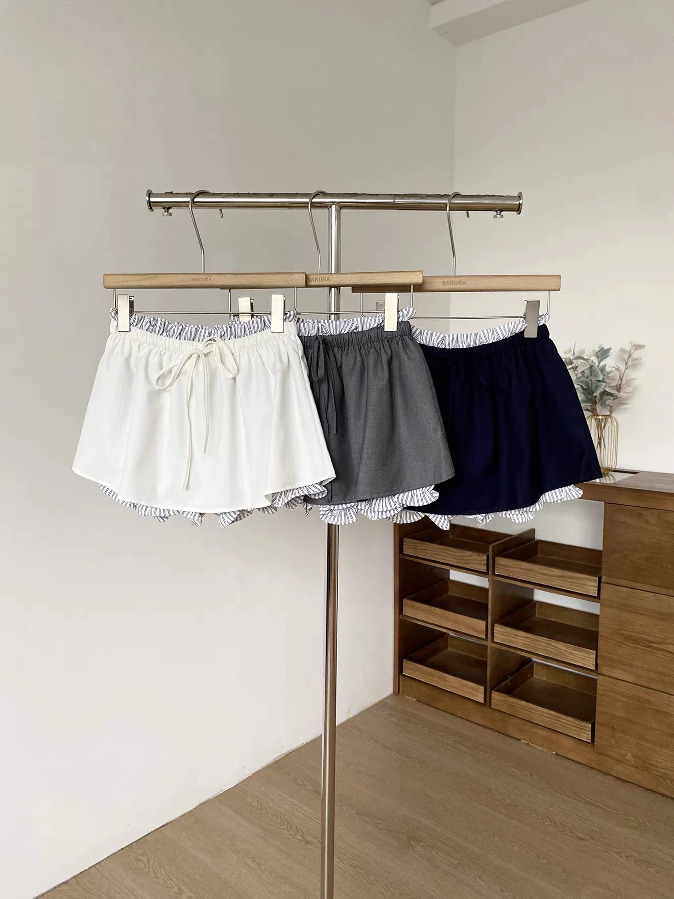 Women's Summer Streetwear Fake Two Pieces Drawstring Waist Mini Skirt With Bud Underpants