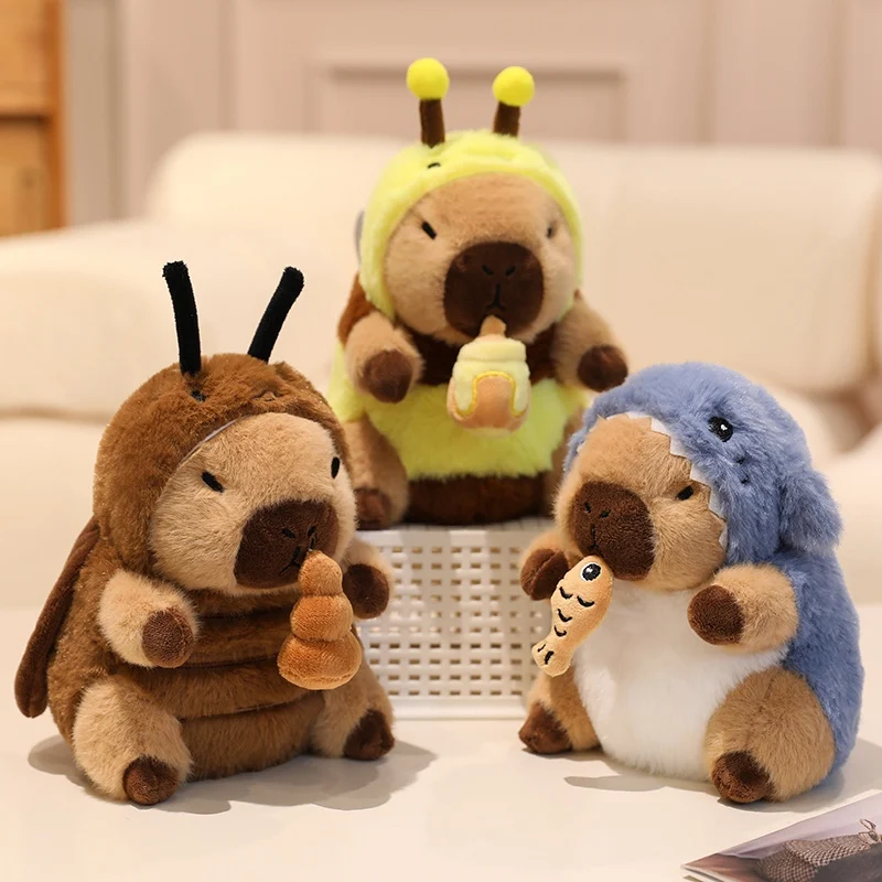 Lindos juguetes de peluche de capibara de 22cm para tirar de la cuerda para transformar en dinosaurio, conejo, tiburón, abeja y cucaracha, juguetes de capibara para niños
