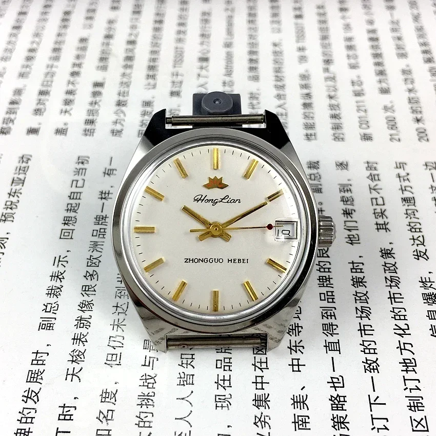 2022NEW Shijiazhuang Watch Factory Medium Sized,red Lotus Brand White Steel Bar,calendar White Face Manual Machine Diameter 32mm