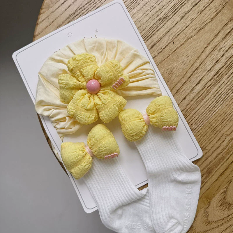 IYEAL Baby Hat النسخة الكورية طفل الفتيات كاندي القوس الأوسط جورب مجموعة الوليد سنة واحدة وشهر واحد هدية مجموعة