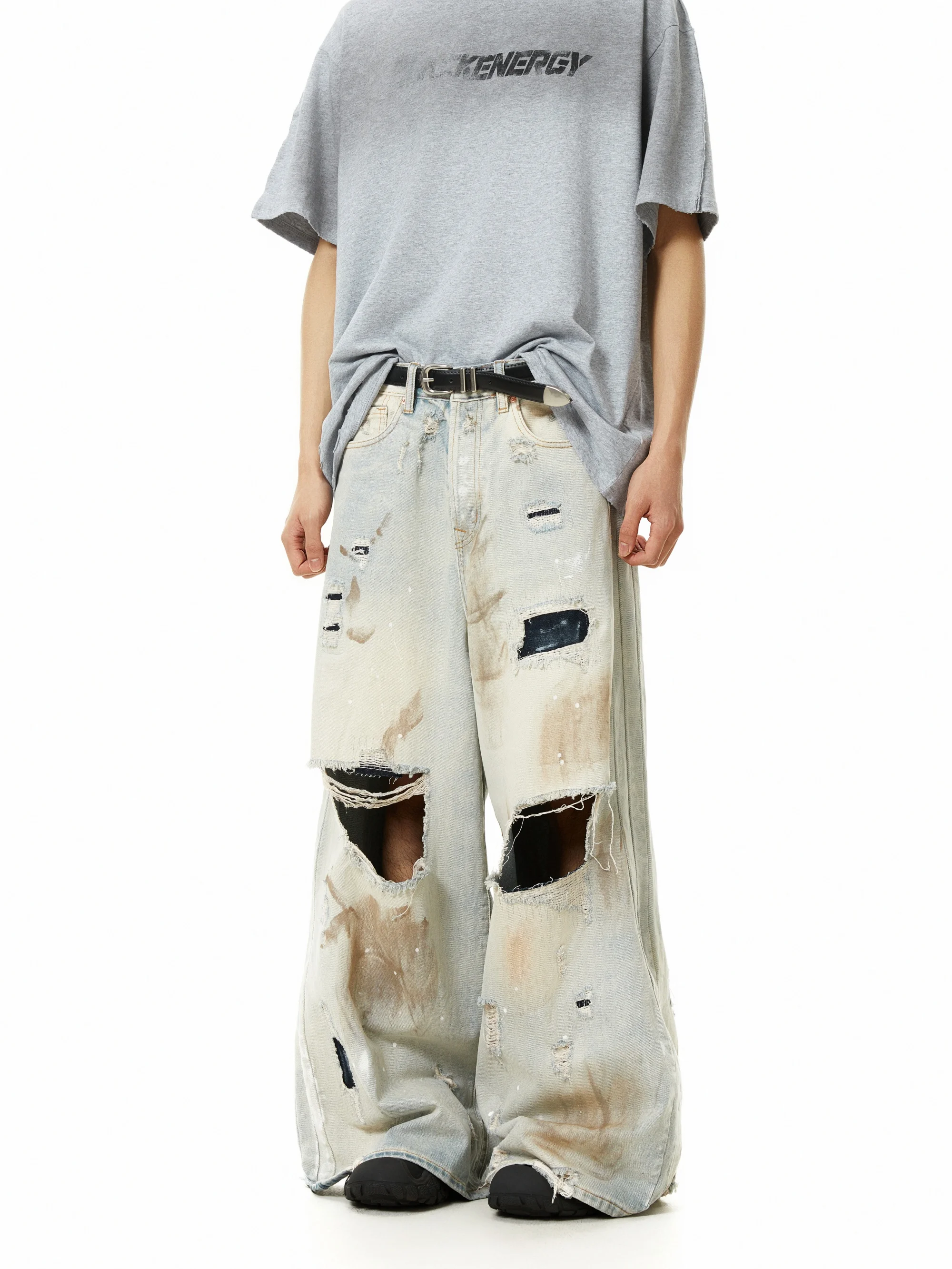 Niche Design moddergeverfde jeans met grote schade en wijde pijpen Amerikaanse retro gewassen dweilbroek