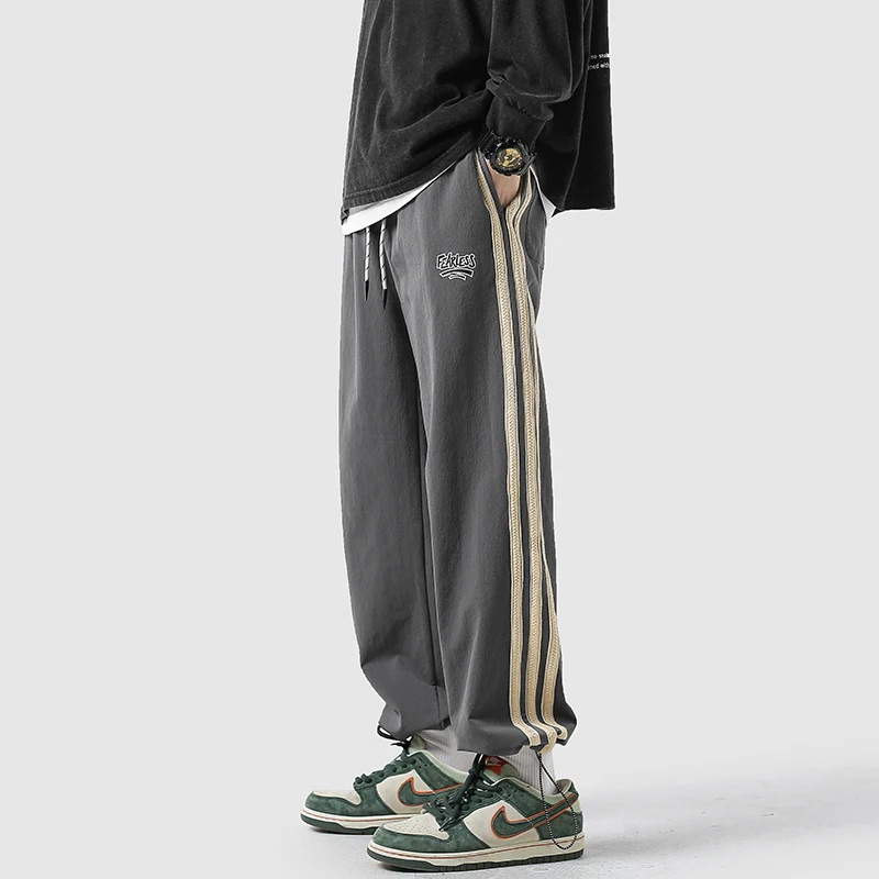 

Мужские свободные брюки с завязками на талии, весенне-осенние, модные, брендовые, черные в полоску, повседневные спортивные штаны в американском стиле, универсальные, для отдыха