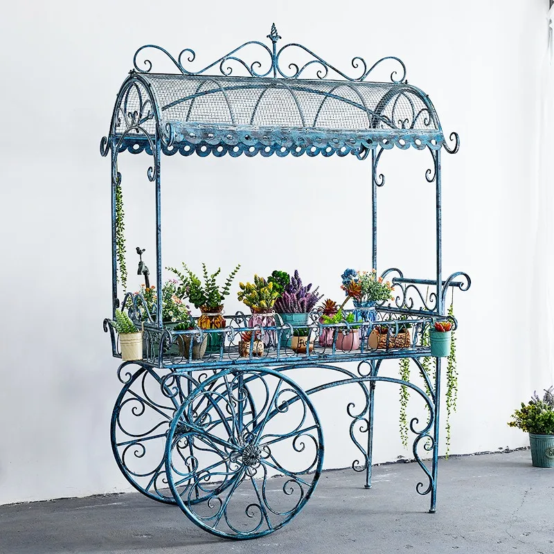 Retro and old, wrought iron float flower stand