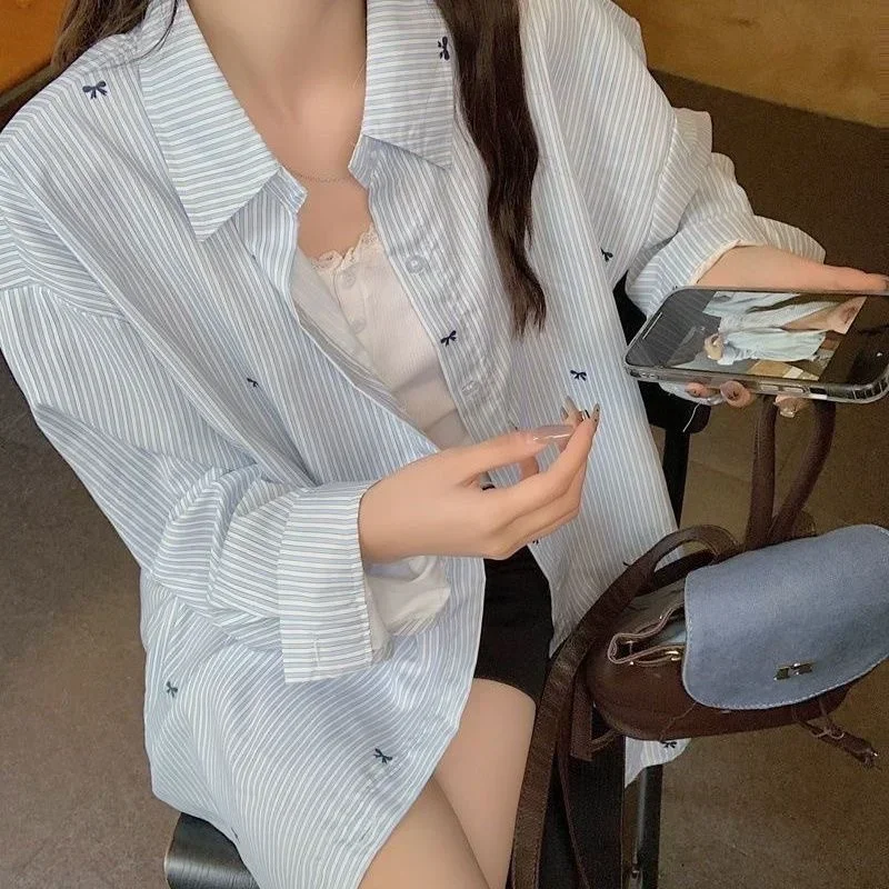 

Blue striped bow print long-sleeved shirt women's spring and autumn design sense niche loose shirt versatile top trendy