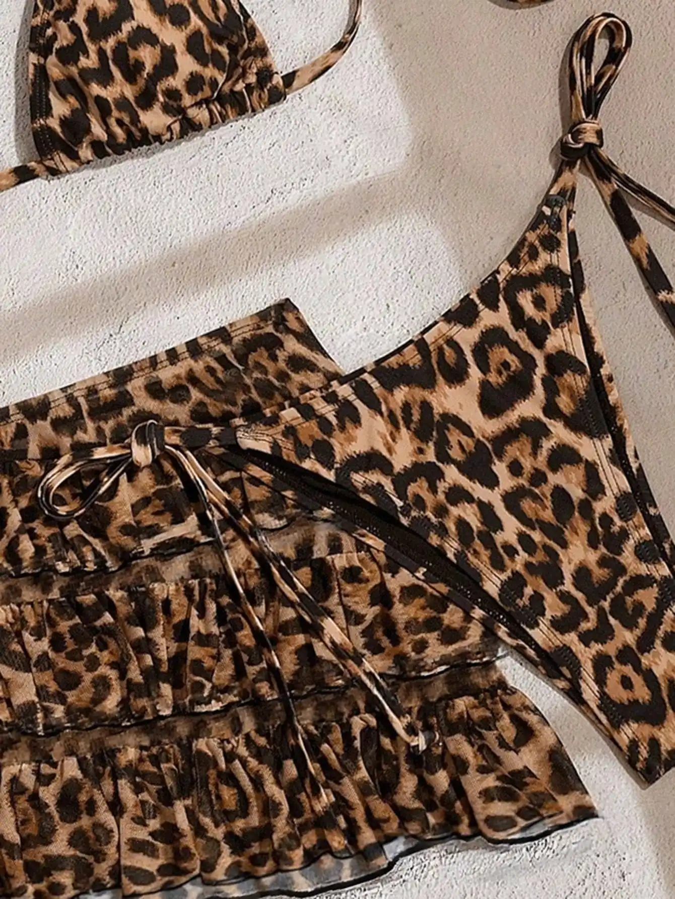 

Y2K Leopard Print Tie-Strap Triangle Top And Ruffled Mini Skirt Three Piece Swimwear Set For Beach Festival