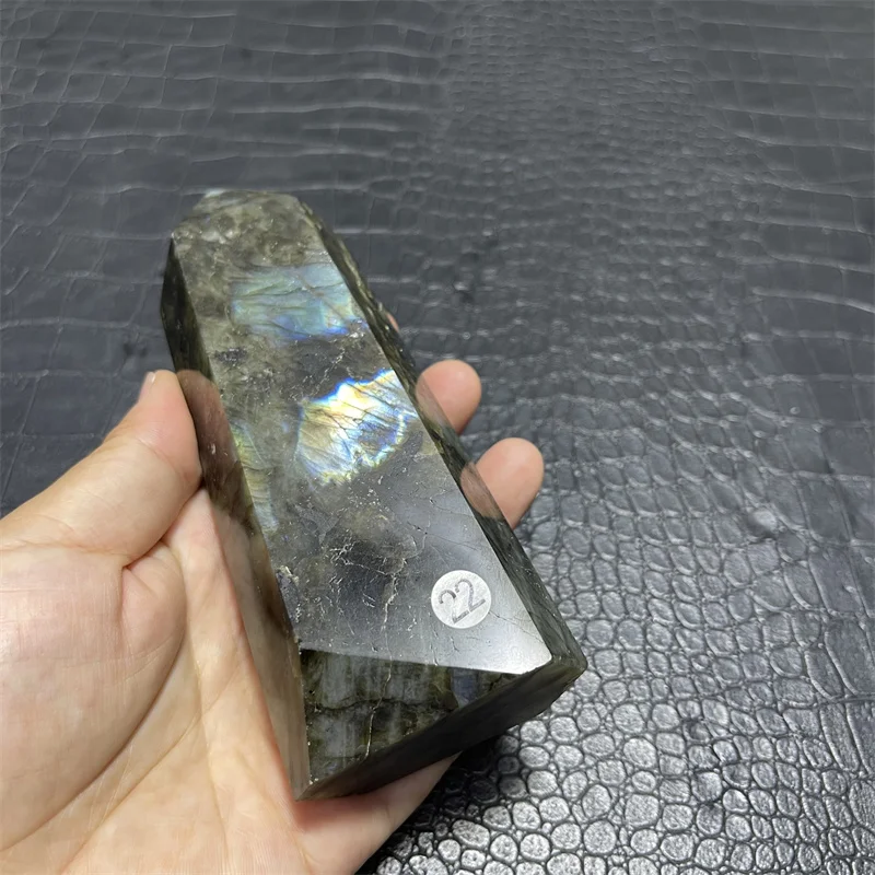 large natural labradorite point with good flash crystal tower