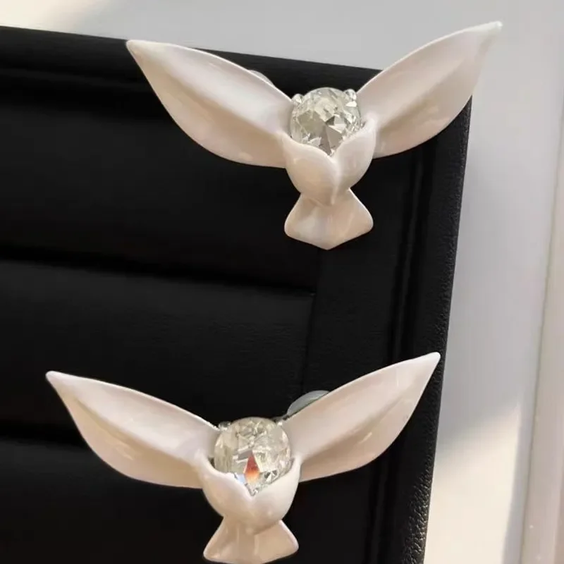 25 spring and summer new niche orchid enamel earrings fresh and sweet versatile stud earrings women's high-end elegant ear