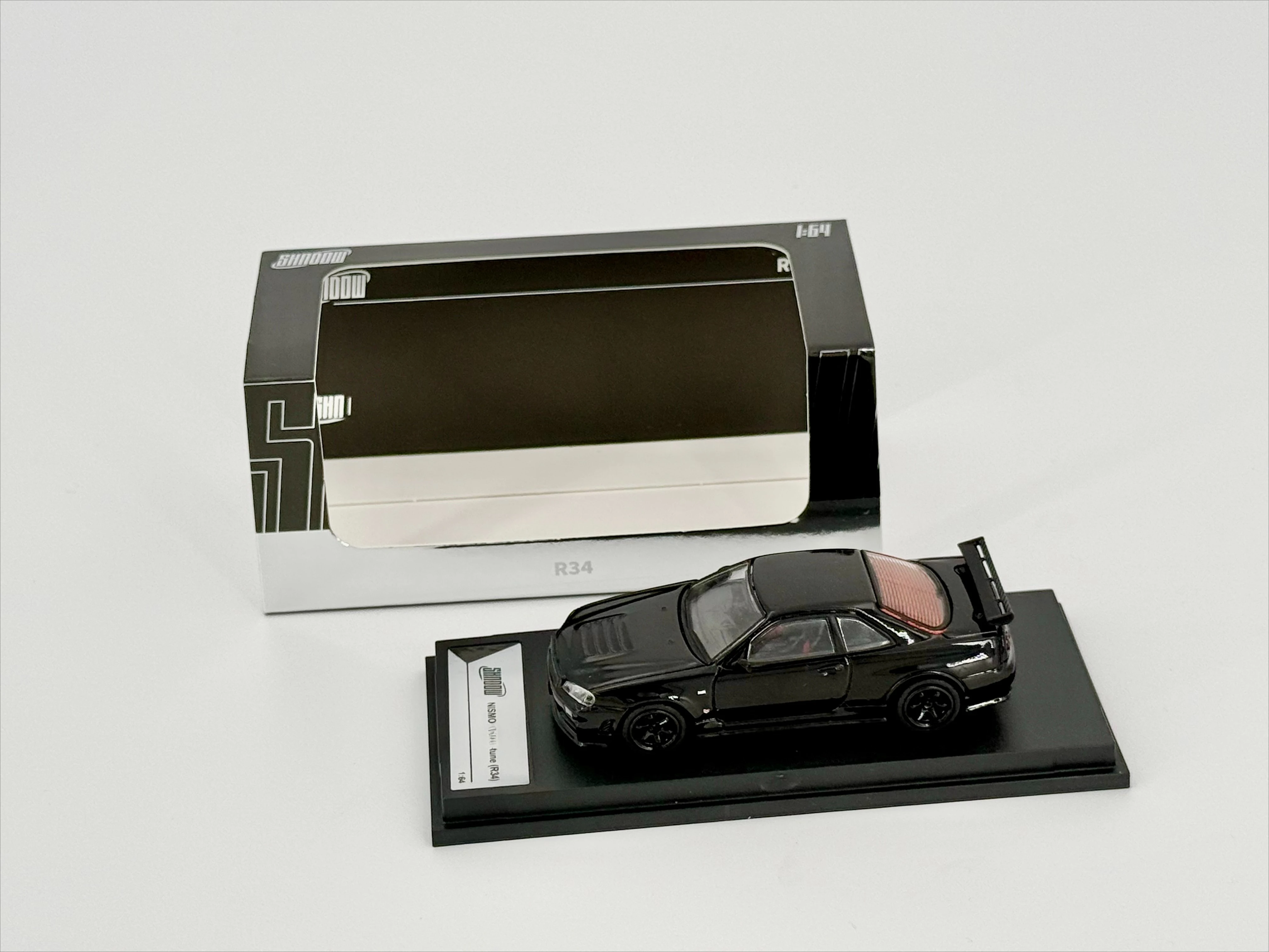 em-breve-modelo-de-carro-diecast-shadow-1-64-skyline-r34-z-tune-preto-laranja-cinza-metalico