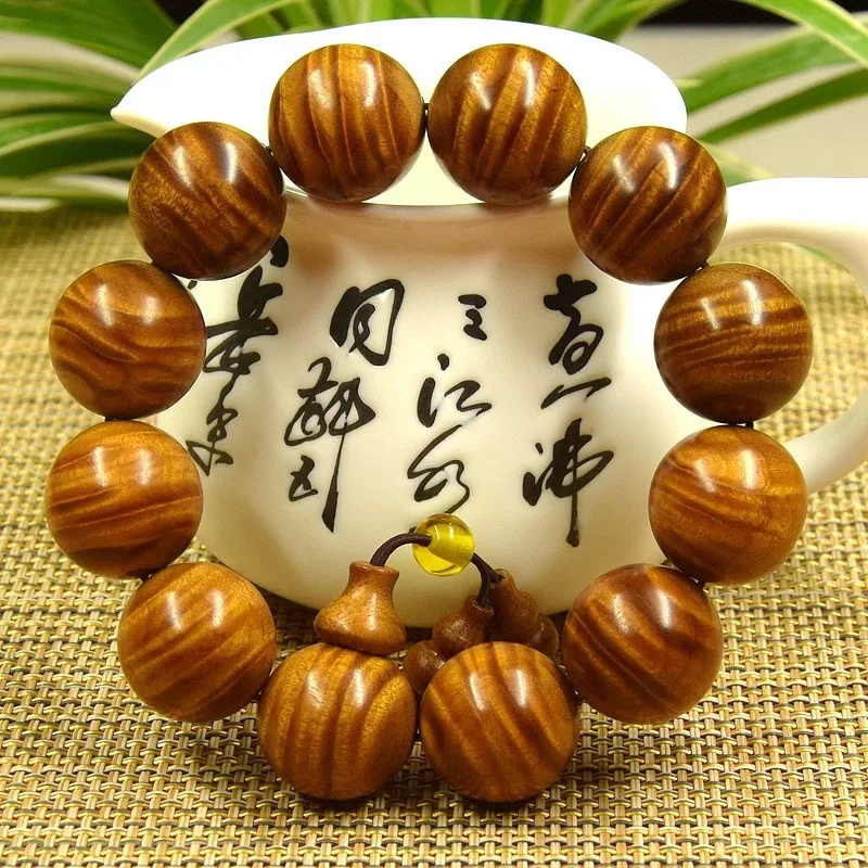 Sichuan golden nanmu bracelet for men, with water wave, lightning, dragon-embossed patterns, made of dark wood and ebony, Bu