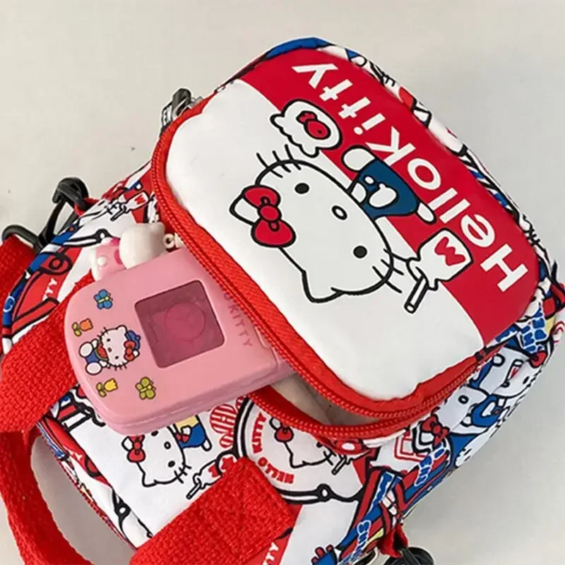 Sanrio กระเป๋าถือลายเฮลโลคิตตี้, กระเป๋าถือแฟชั่นผ้าใบแคนวาสสำหรับกระเป๋าเดินทางแบบพกพาของขวัญวันหยุดสำหรับเด็กกระเป๋าสะพายไหล่