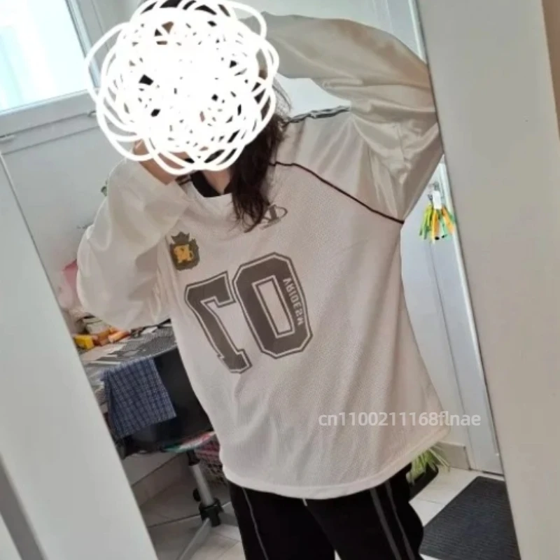 アメリカンストリートダンスコスチュームレトロスタイルVネックルーズ長袖ジャージスタイルTシャツファッショナブルなハイエンドトップ女性用