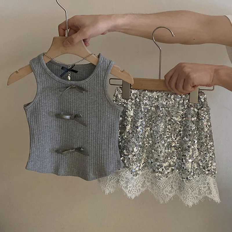 Girls\' bow knit vest Korean version of children\'s wear 2024 summer new temperament lace splicing sequin short skirt tide