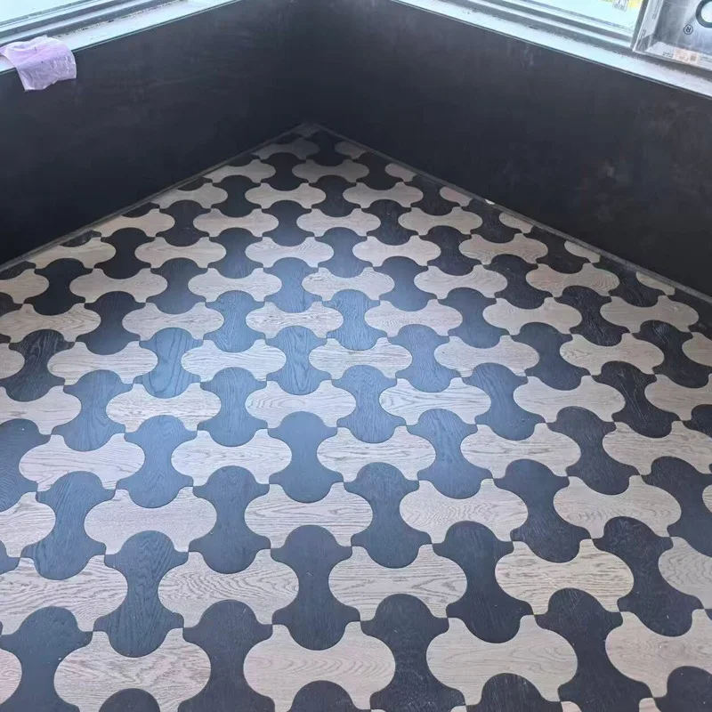 Black and white two-color special-shaped floor personalized hotel model room, two-color special-shaped parquet floor
