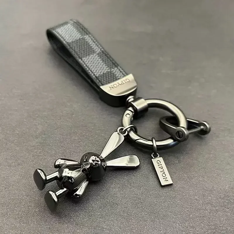 

Neutral leather rotating car Continente chain, cute Pareja pendant, Alta Calidad gift 2025