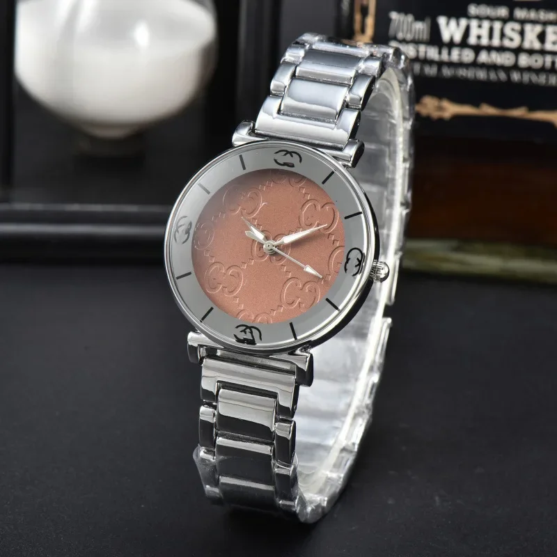 ​ ​ 2025 ساعة رياضية نسائية فاخرة ستانلس ستيل حركة كوارتز ياقوت كريستال مقاومة للماء 100 متر تصميم بسيط