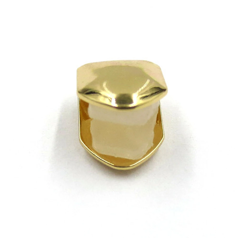 Nuovo Rapper Hip Hop Denti con grillo singolo Scava fuori Personalità Cappucci per denti singoli Fondo superiore in metallo Set di denti dorati dentali Unisex