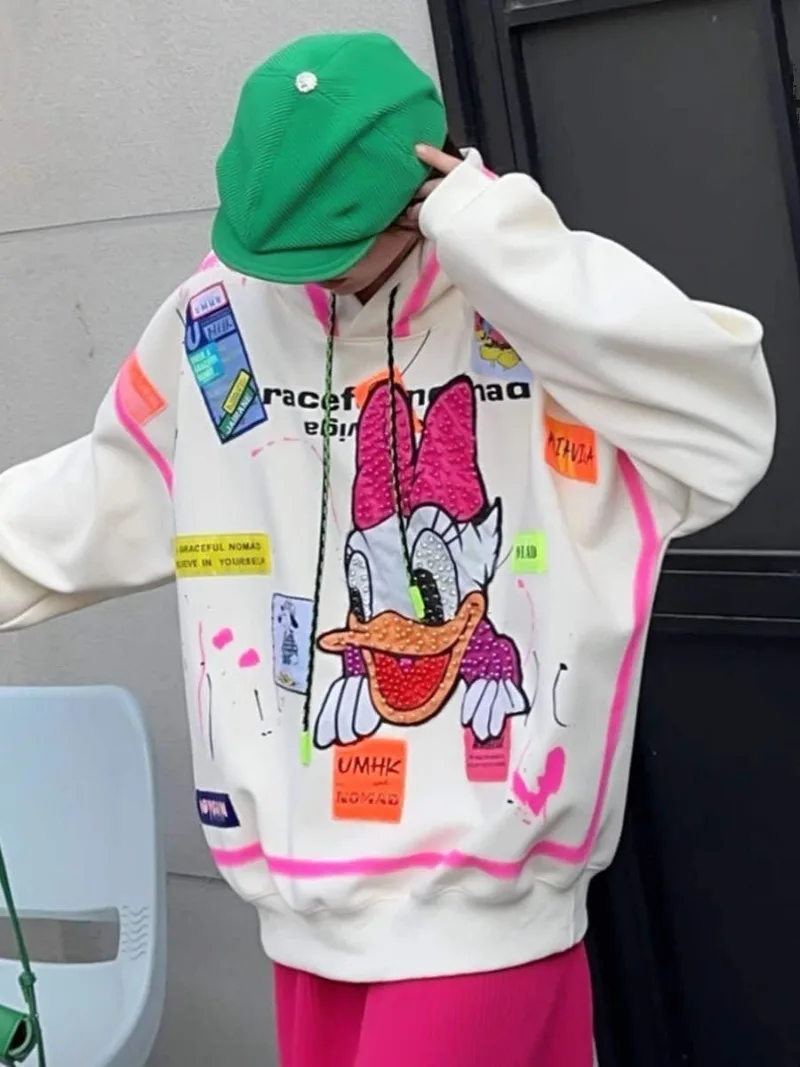 Übergroßer mittellanger Hoodie 2024 Herbst neuer Cartoon Patch Pailletten Kapuzen pullover Damen lose lässige Langarm Pullover