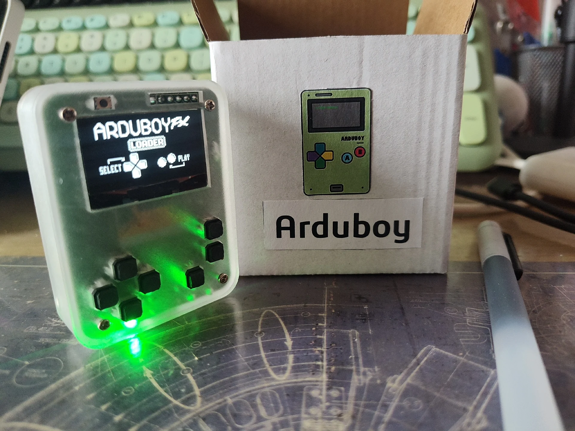 

Arduboy FX - Handheld Game Console, Programmable for Custom Games, Rechargeable Expandable Battery Portable Retro Gaming Console