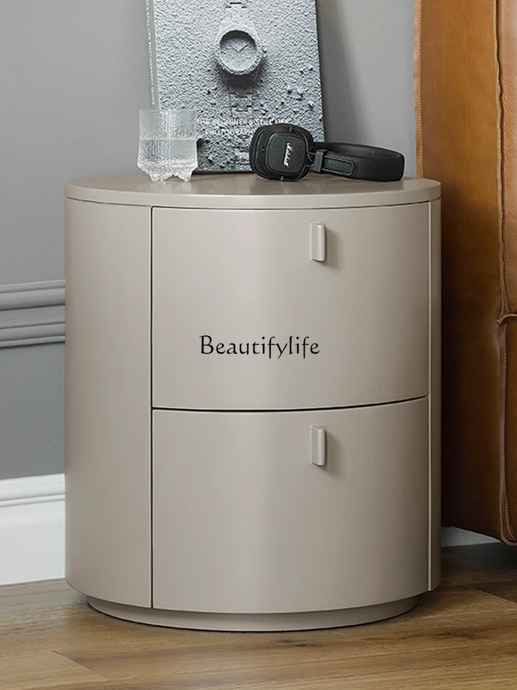 

Modern simple round bedside table Italian solid wood locker