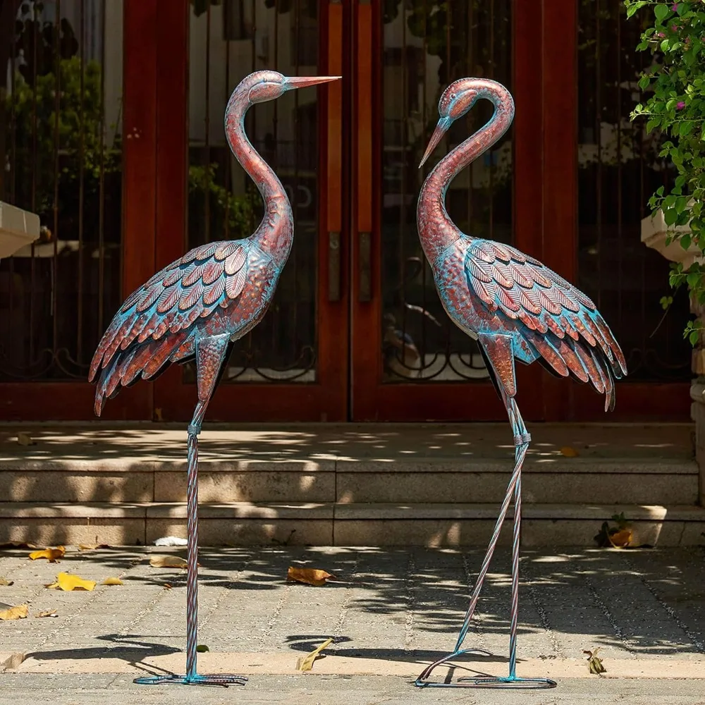 

Garden Crane Statues Patina Heron Decoy, Standing Metal Crane Sculptures Bird Yard Art for Outdoor Decor, Set of 2