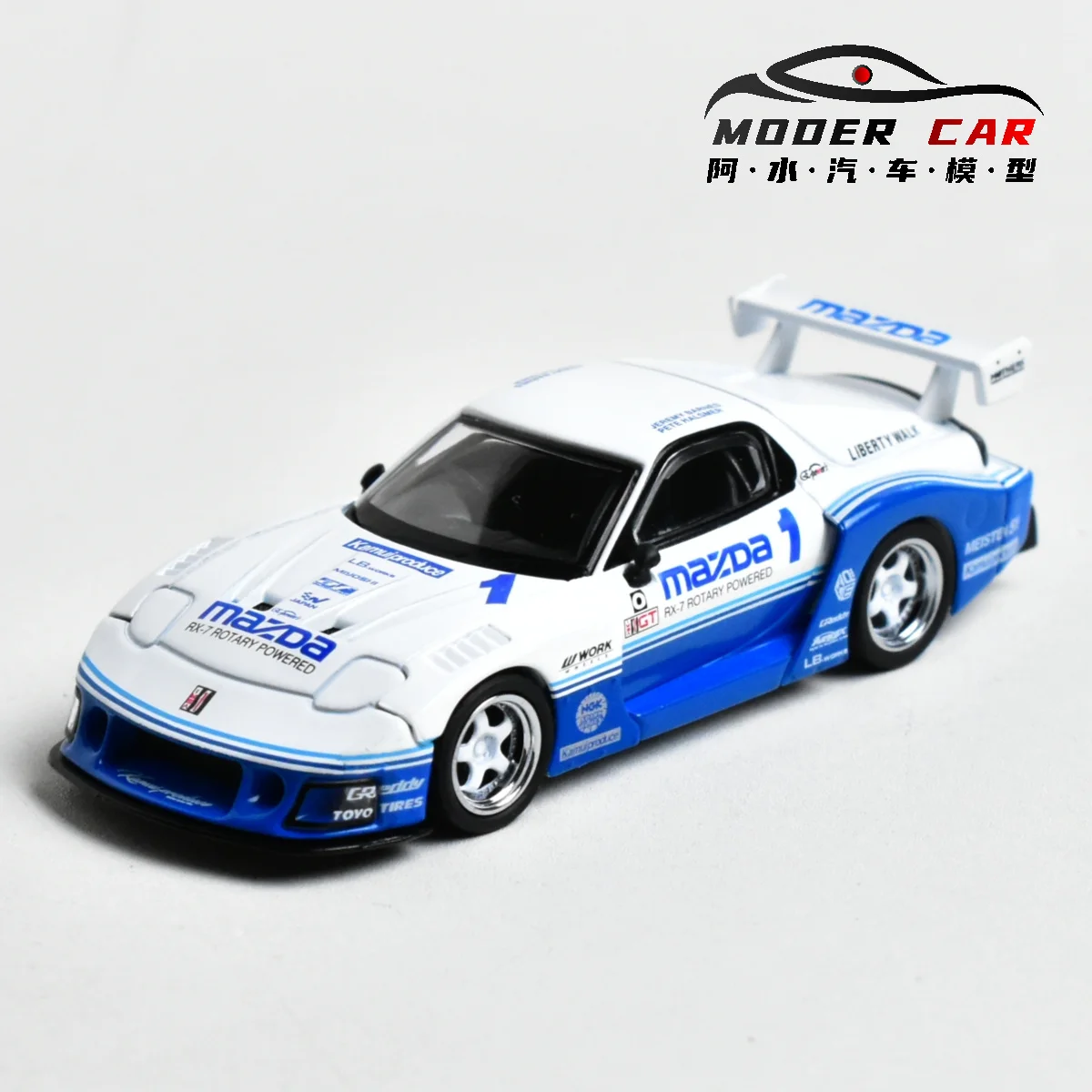 

Литая под давлением модель автомобиля MINIGT TSM 1:64 1011 MAZDA RX7