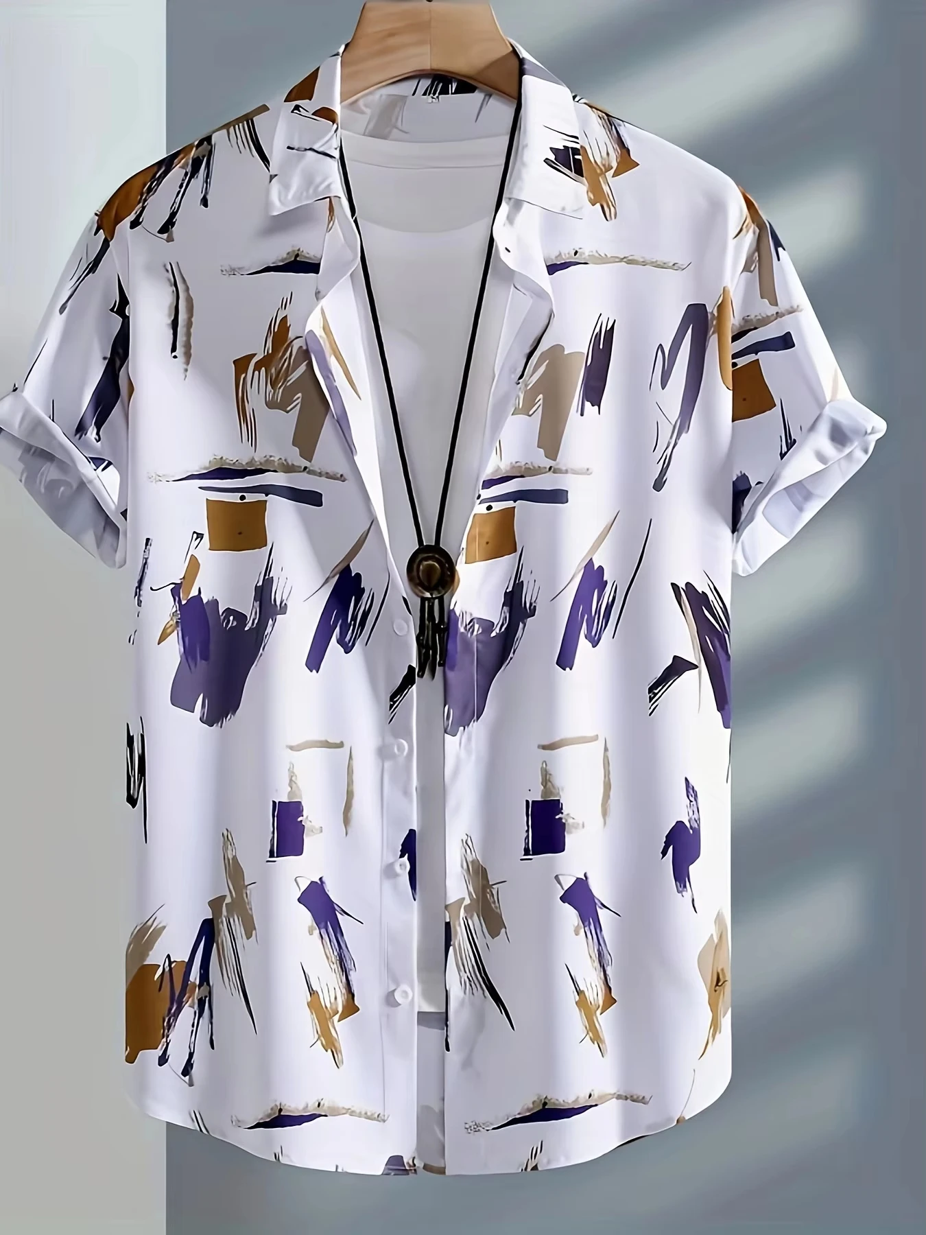 

The new men's short-sleeved shirt for summer 2026 features a casual fashionable comfortable and soft 3D graffiti pattern print