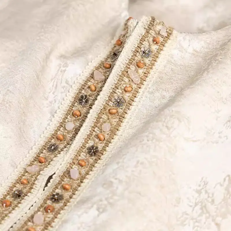 سترة جاكار من الحرير الساتان برقبة دائرية مطرزة على الموضة الصينية التقليدية الجديدة ملابس خارجية بدون أكمام