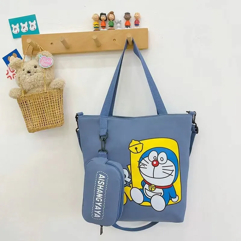 Doraemon-monederos y bolsos de mano Kawaii para mujer, bolso cruzado de un solo hombro, monedero bonito