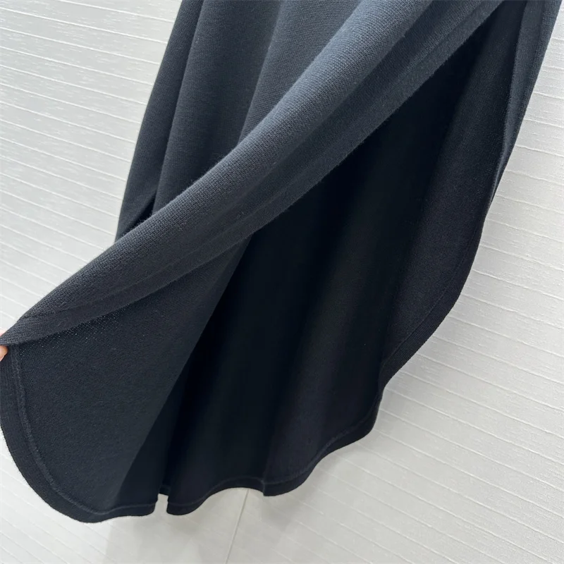 Suéter de mujer nuevo top de manga larga de punto elástico para otoño 2025 jersey asimétrico de cuello alto mezcla de lana cuello alto de mujer