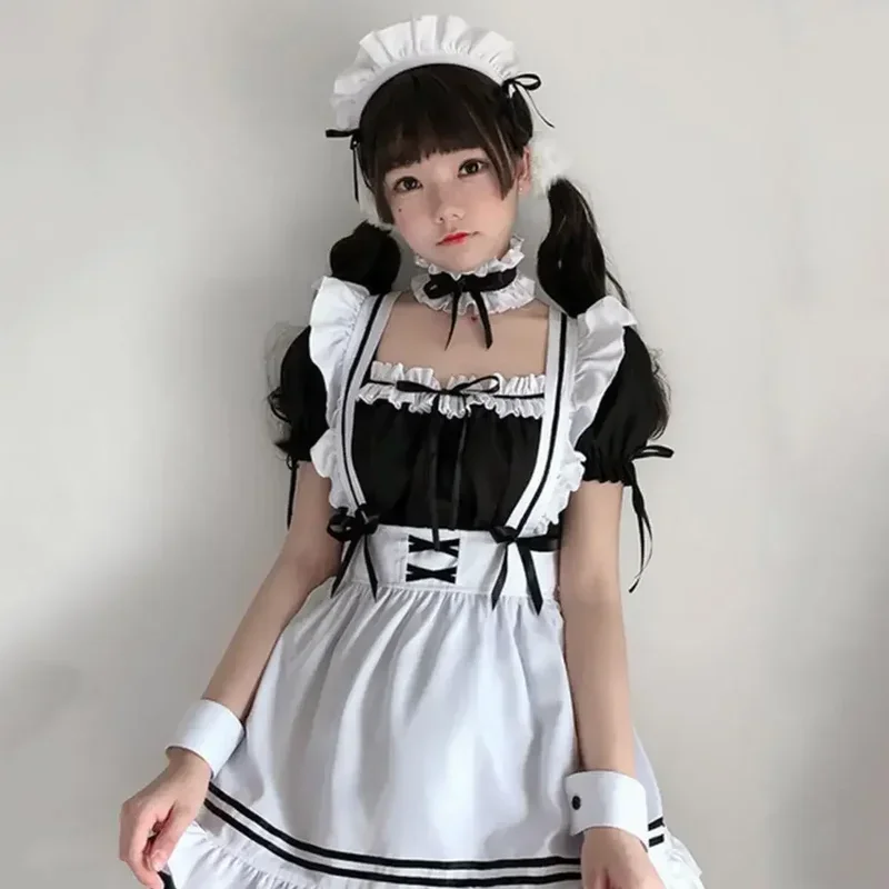 Cosplay ragazza carina Costume nero bianco grembiule vestito Lolita vestito Anime gonna lunga Cafe Costume Cosplay muslimama