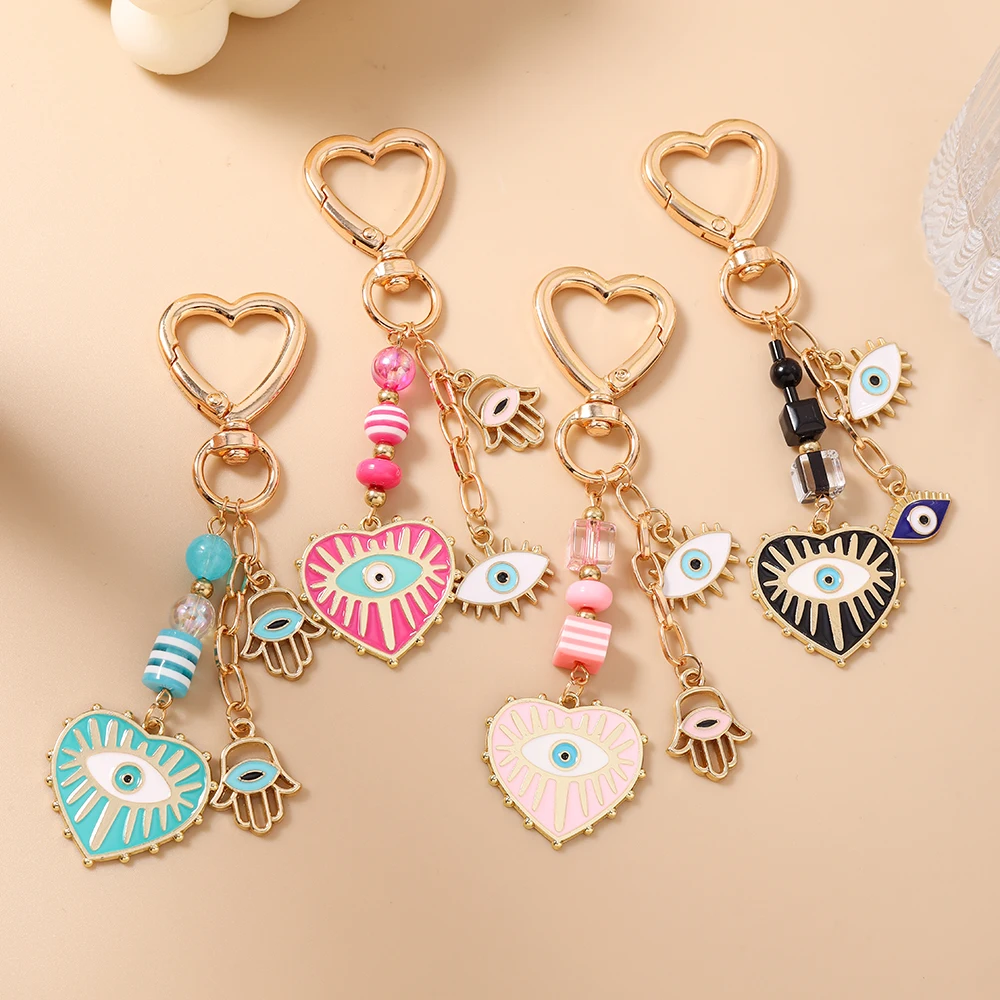 Aihua Emaille Hamsa Hand Evil Blue Eye Schlüsselanhänger Legierung Liebe Herz Teufelsauge Schlüsselanhänger für Frauen Autoschlüssel Tasche Zubehör
